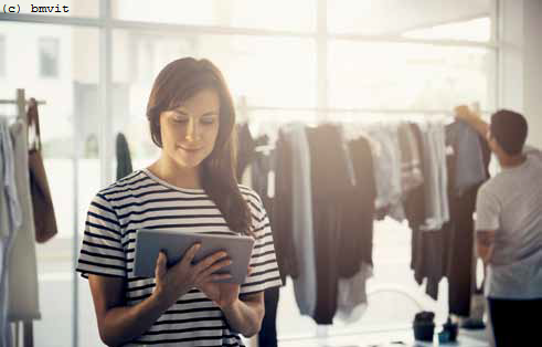 Girl with tablet tries on clothes virtually